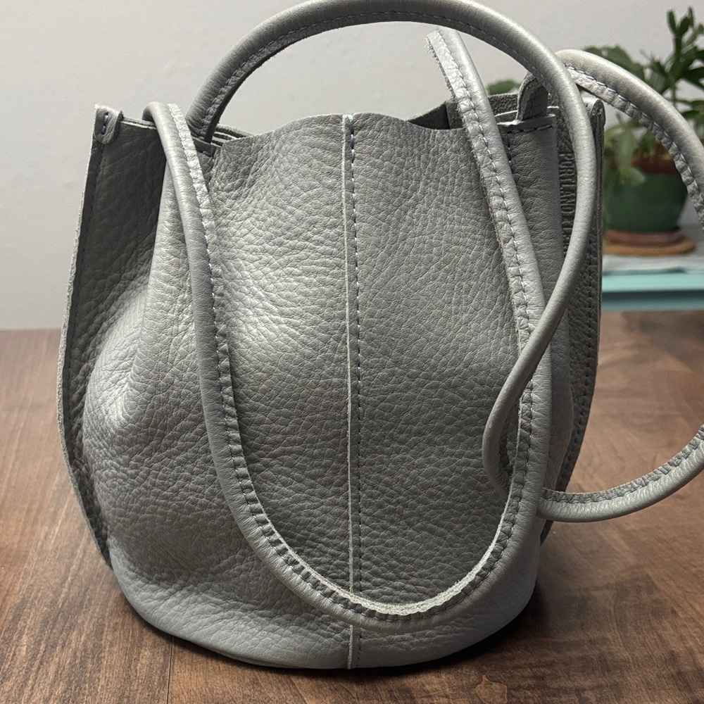 Nimbus gray small sized Devan. New never carried.